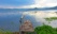 Lac Taal avec un pêcheur au lever du soleil
